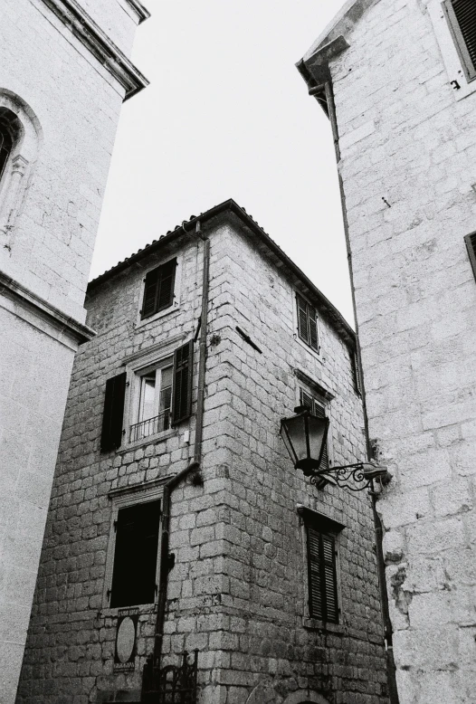 black and white pograph of two building towers