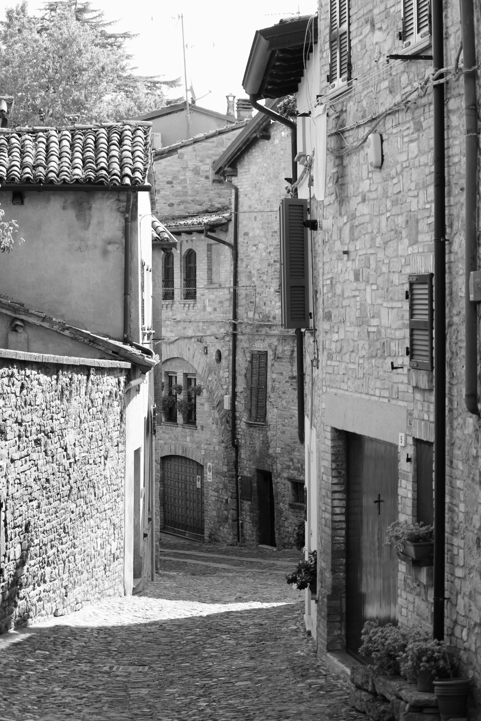 a black and white po of brick buildings