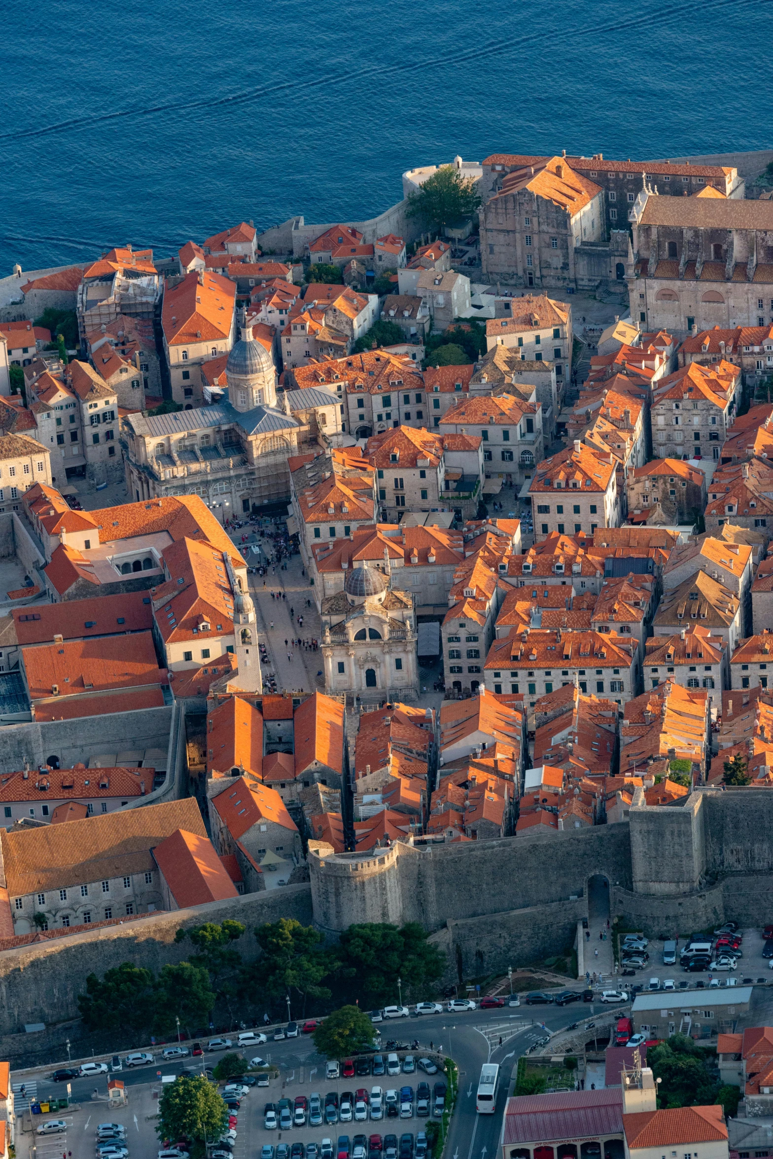 many buildings in a row by the water