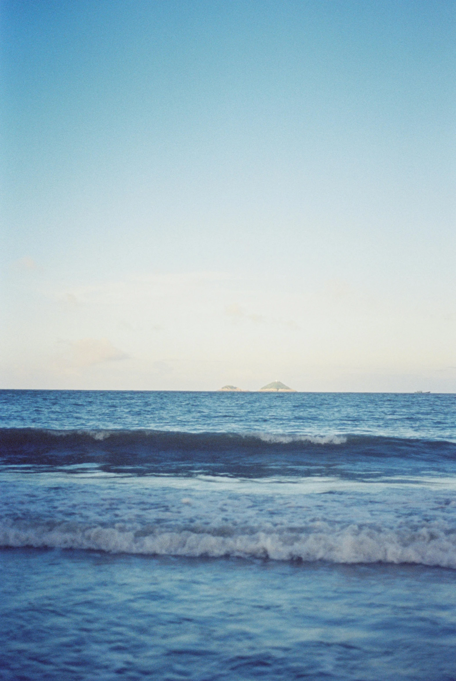 a body of water next to a beach