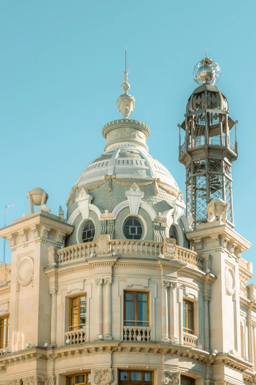 a large building with a clock tower sitting at the top