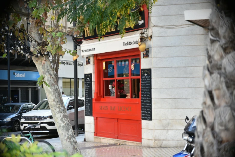 a motorcycle parked outside of a store front