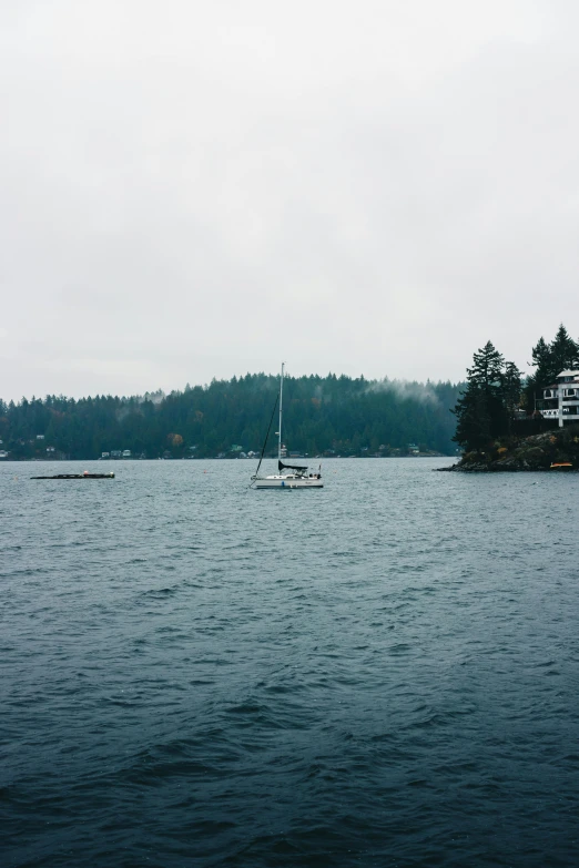 a boat is out in the ocean on the water