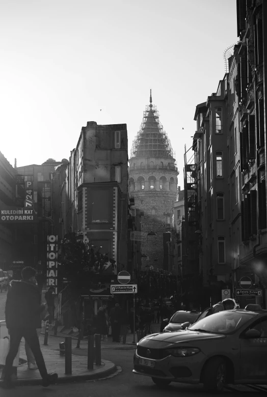 a city street in a big city with people and cars