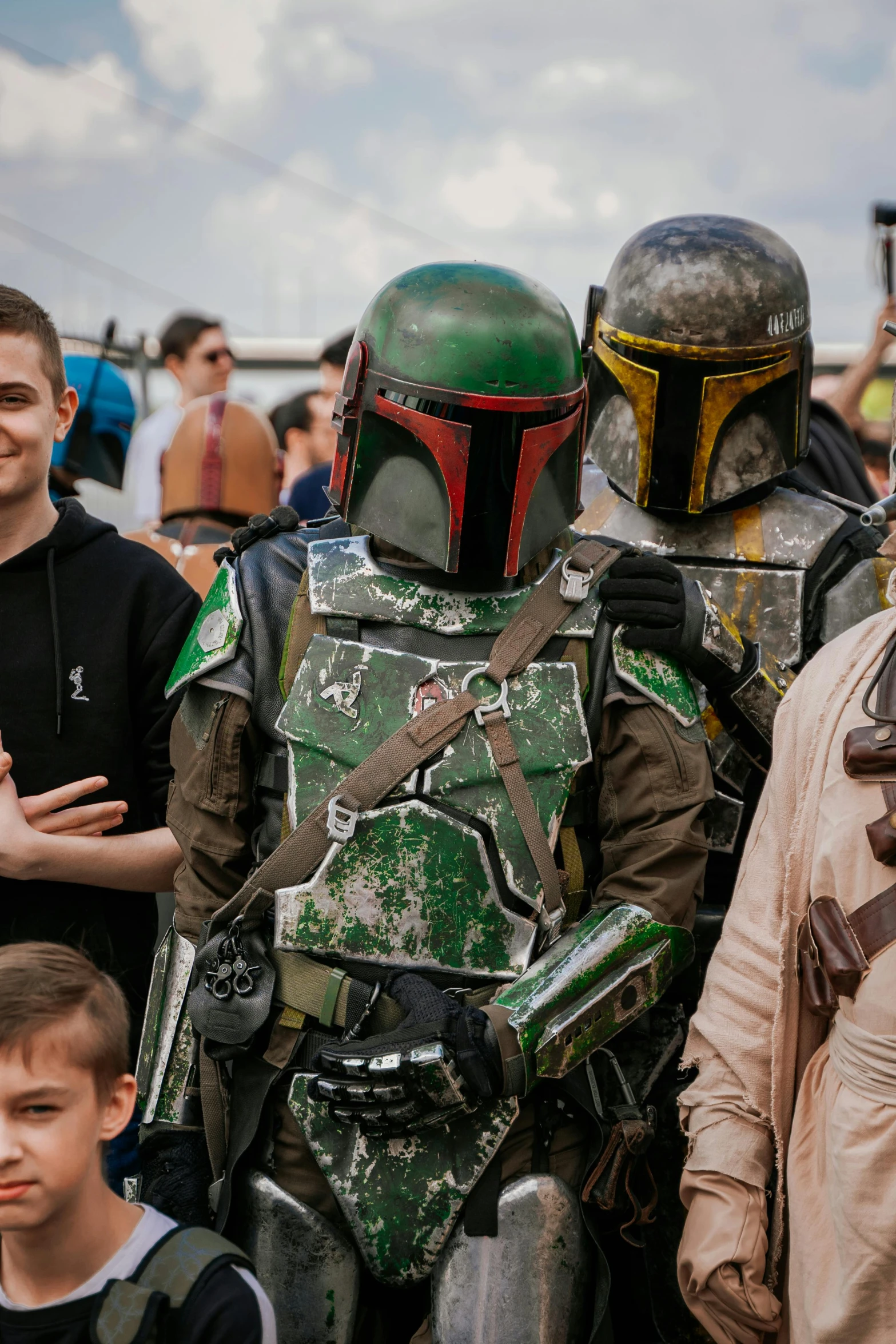 a group of people are standing with a boba fett costume on