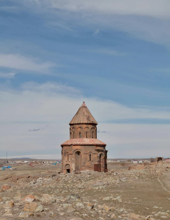 an old, abandoned building in the middle of nowhere