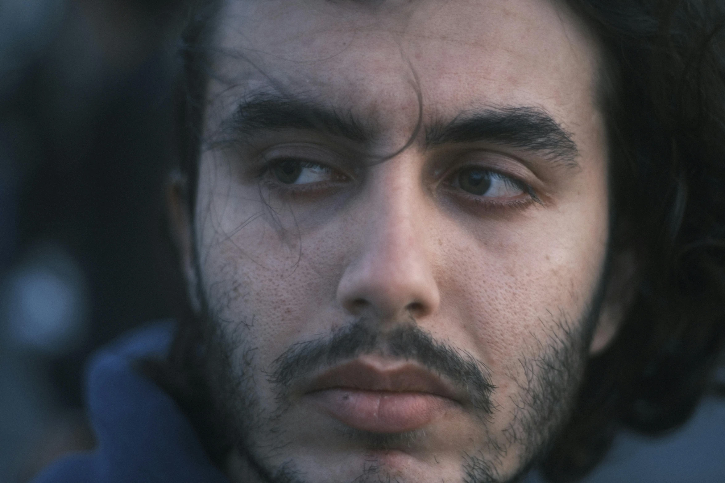 a close up s of a man with a mustache