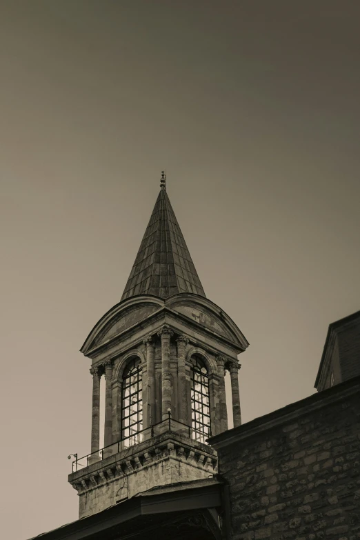 black and white po of a large brick tower