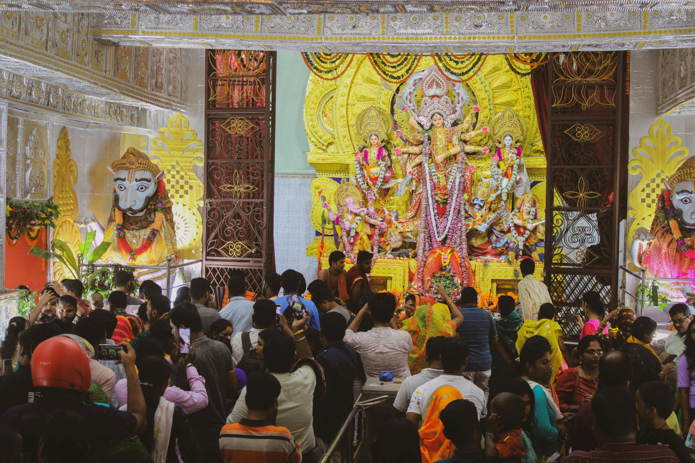 there are many people that are sitting in the temple