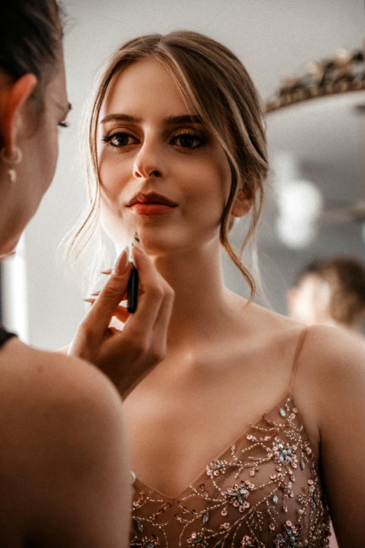 a close up of a person brushing her teeth