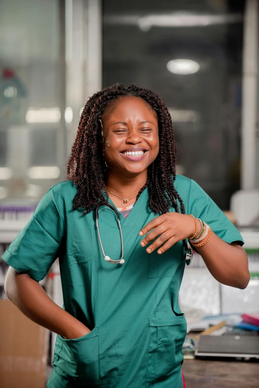 an african female medical professional looking at the camera