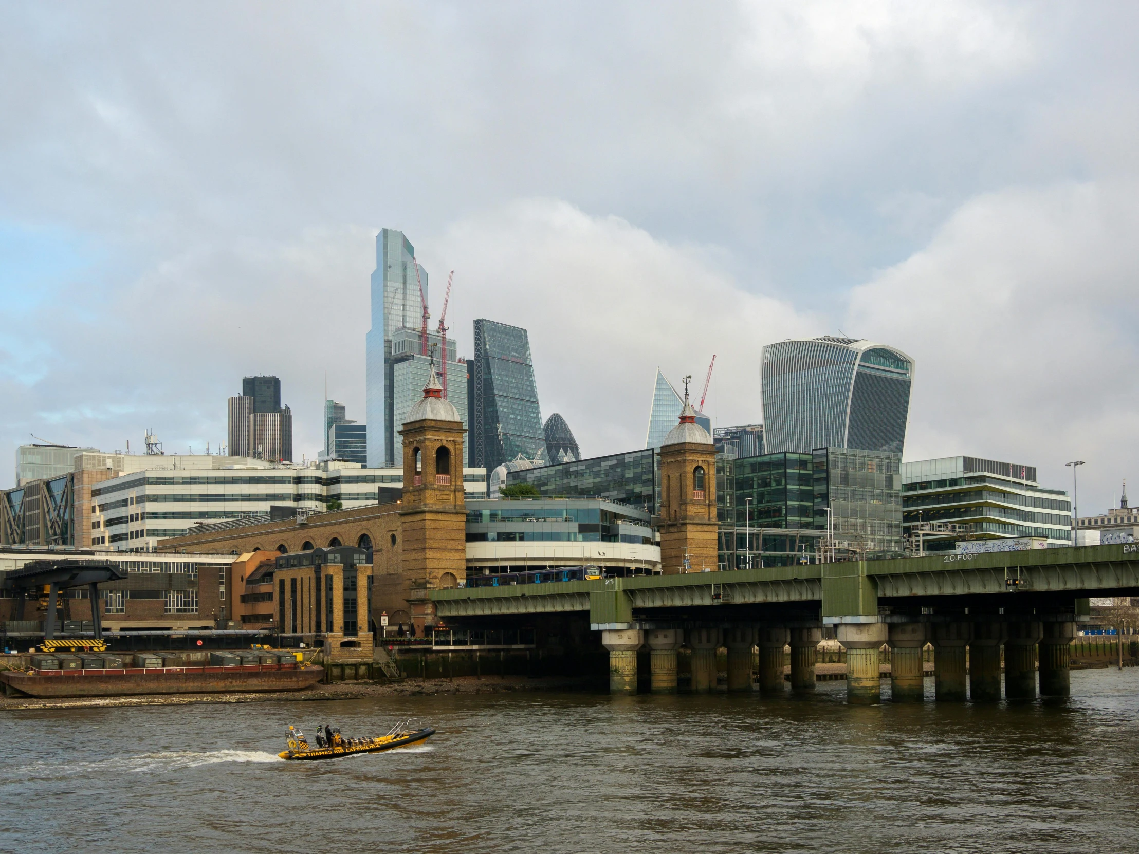 there are buildings that are seen across the river