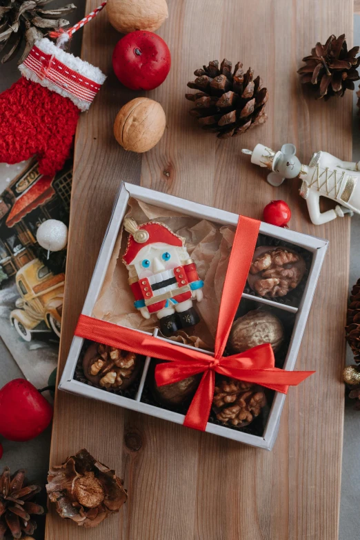 christmas treats are displayed in a box