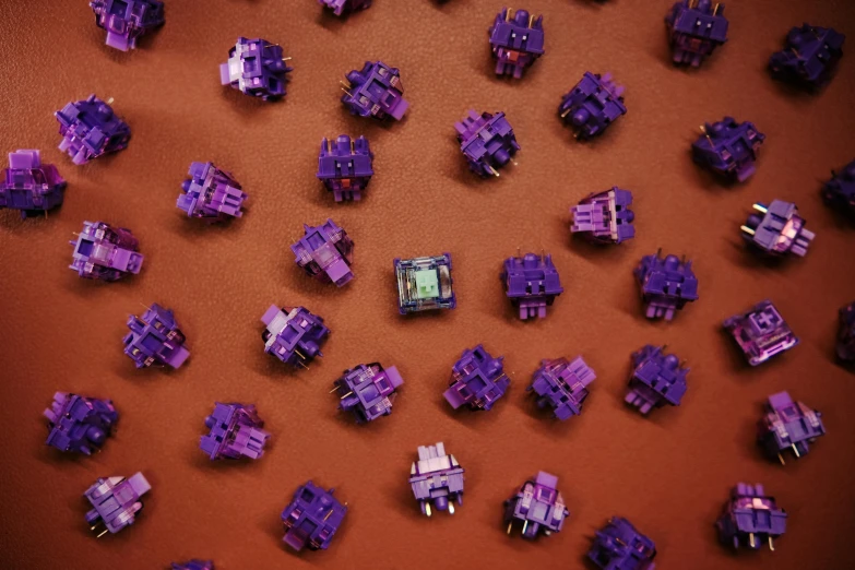 purple pixeles on a brown background