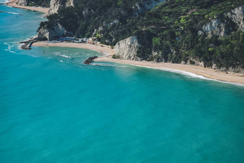 a small beach on an island off the coast