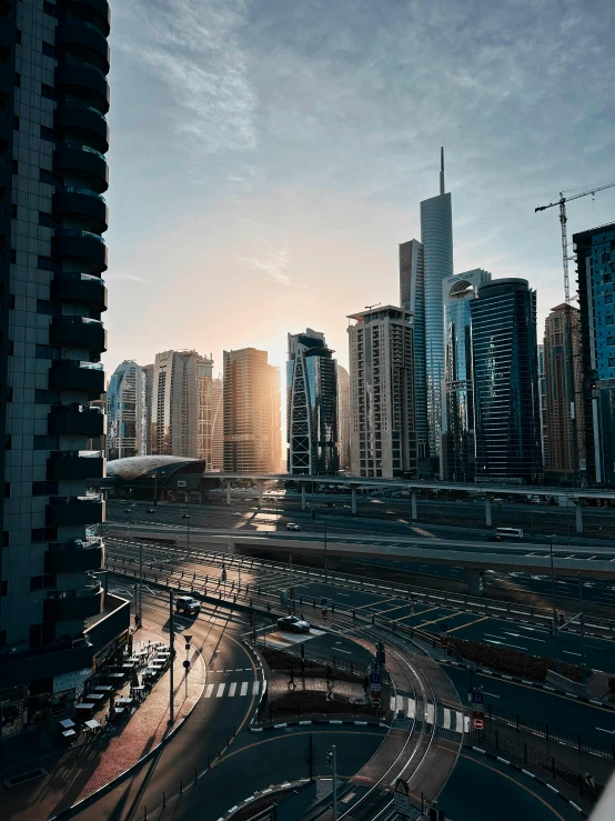 cityscape with traffic in the middle of a large highway