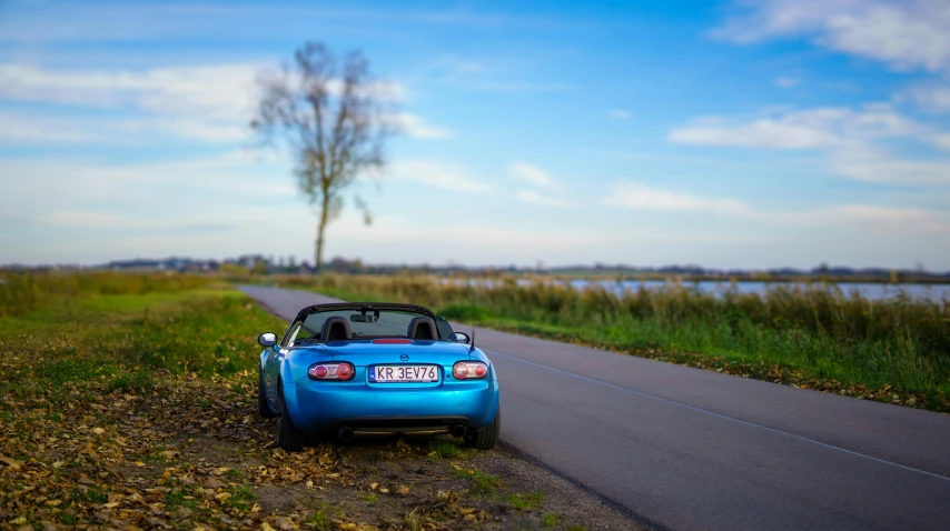 an automobile that has been parked in the road