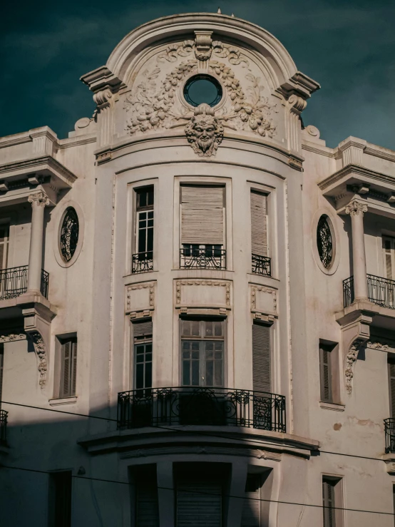 an old building with many balconies on the top