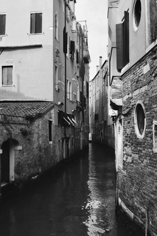 some buildings with the water running down them