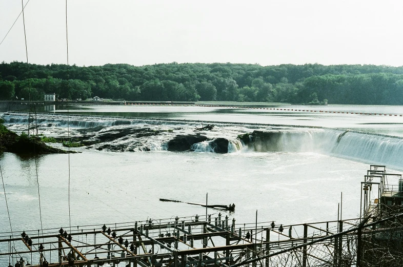 a picture of an industrial landscape and a bridge