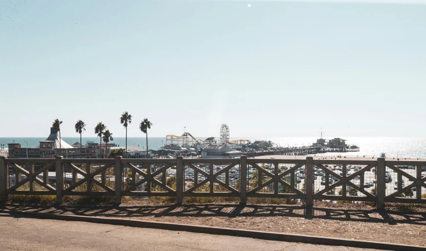 the dock has a view over the beach