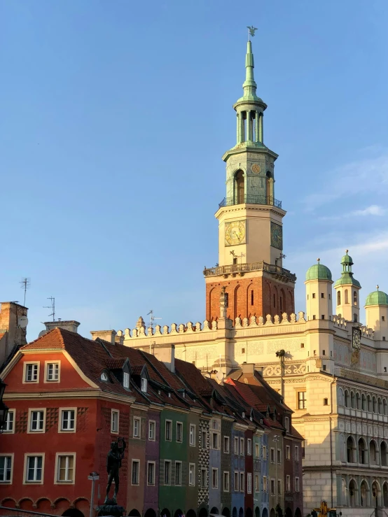 an old building with towers with spires on top