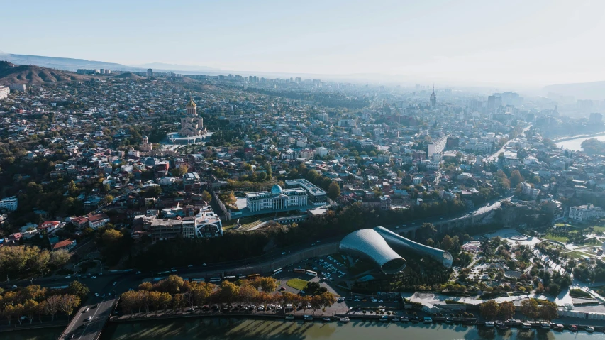 aerial pograph of city and river from above