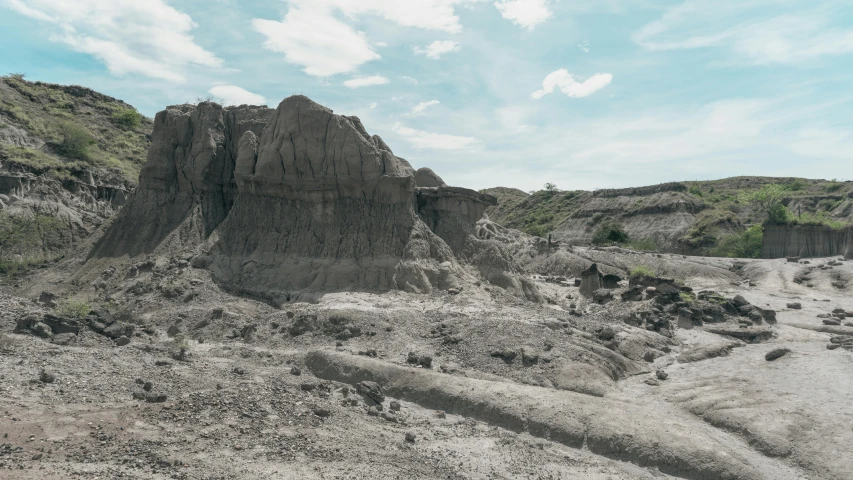 several sand hills next to each other with a sky background