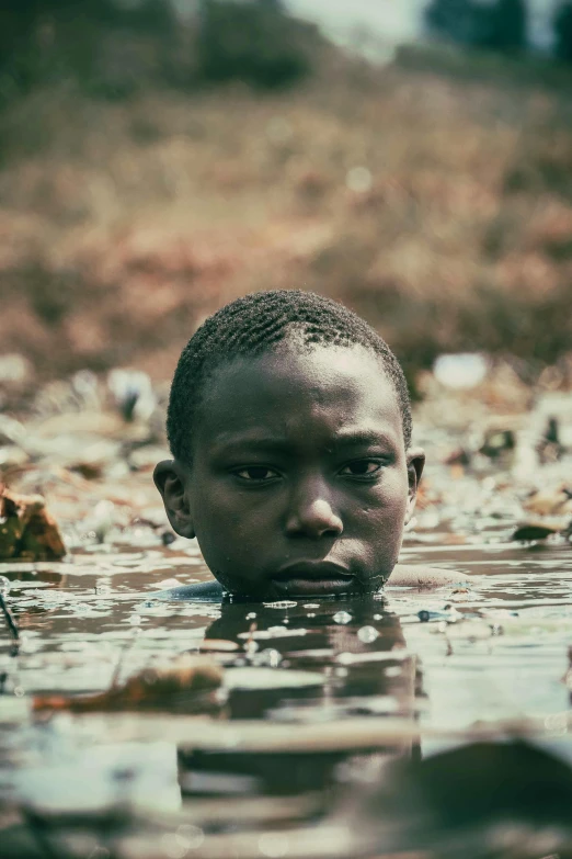 the man in the water is alone