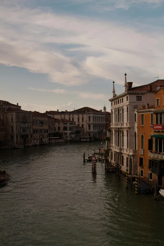 a river running through a city near tall buildings