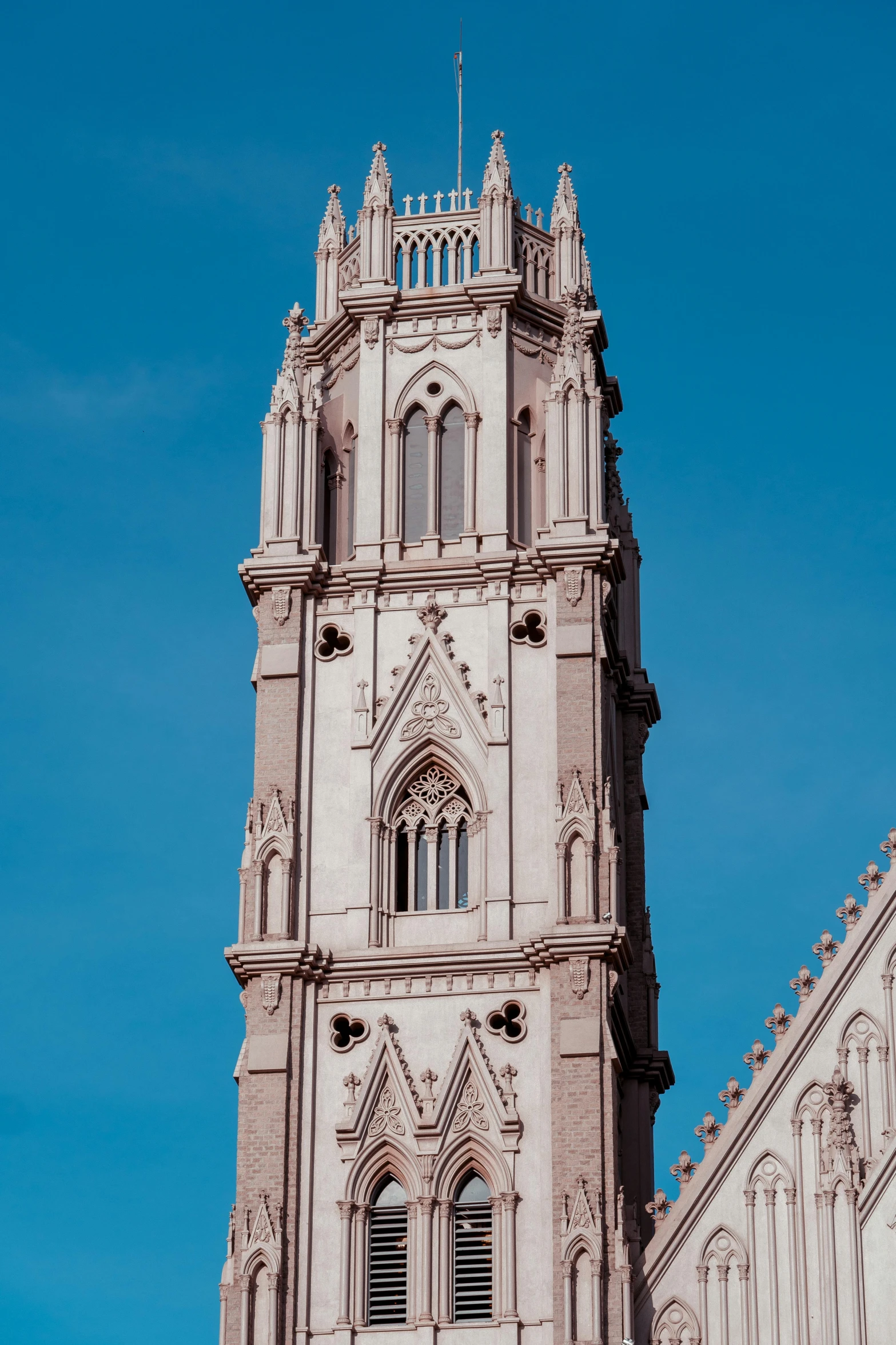 a large tower of an old white building