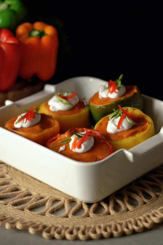 small appetizers in a white dish on a wooden table