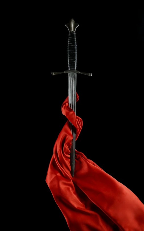 a sword and a red silk covered sword