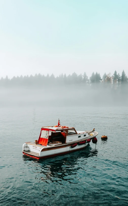 a large boat floating on top of a body of water