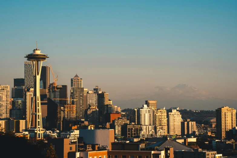 the city skyline is surrounded by tall buildings