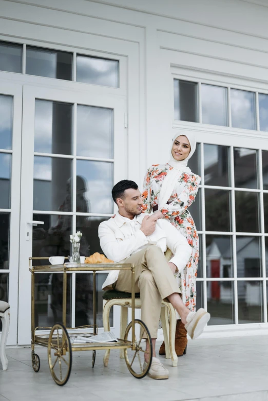 an image of a man and woman that are on a cart