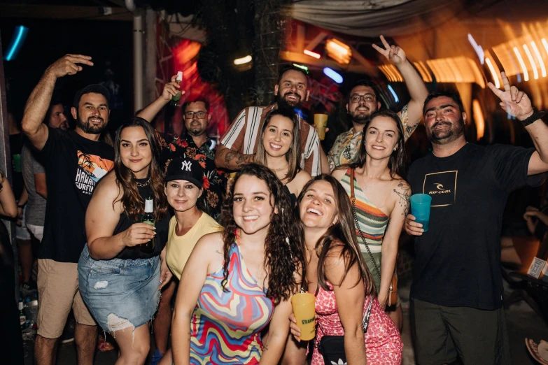 a group of people at a party standing together