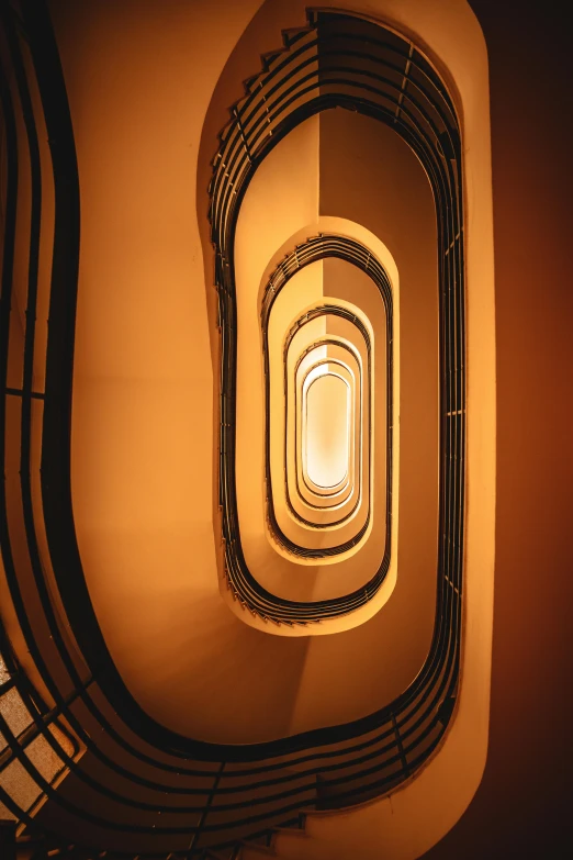 a light fixture hangs from the ceiling of a building