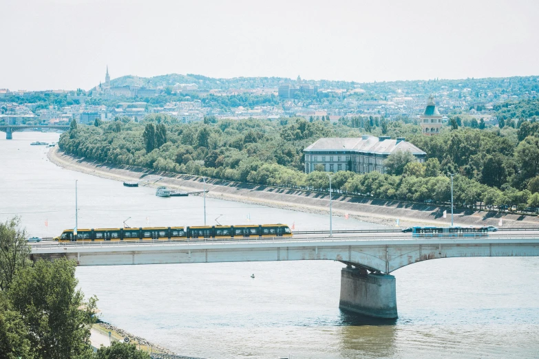 there is a train crossing the bridge