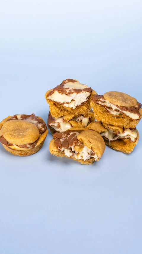 a stack of cookies with peanut er and chocolate chips on top