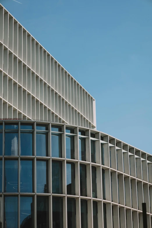 the facade of a building with many windows