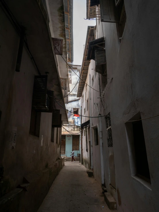 there is an alley way between two buildings