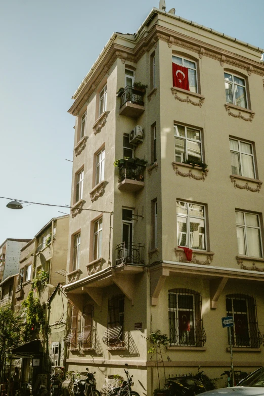 a three story building with balconies and balconies on the balconies