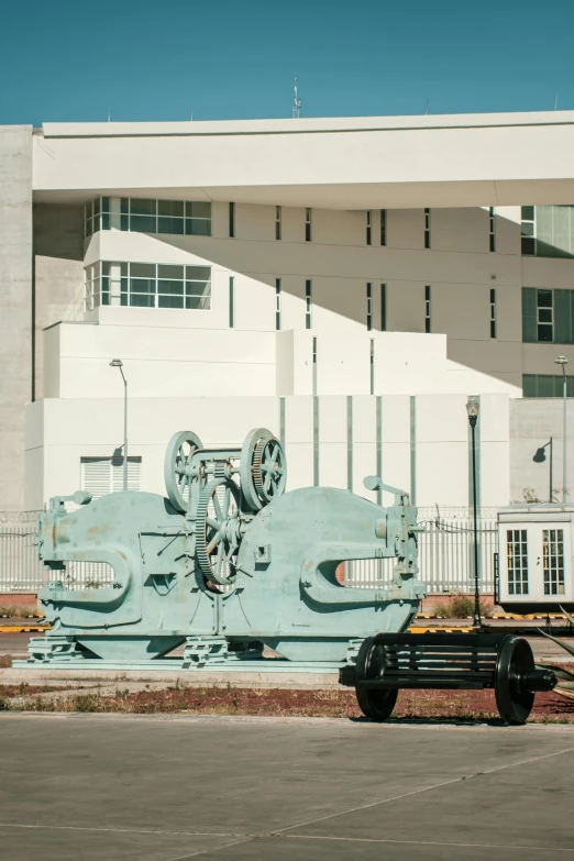 a large vehicle art outside of a building