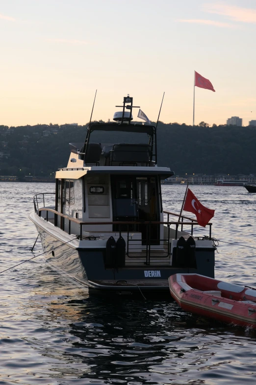 a boat and two boats in the water