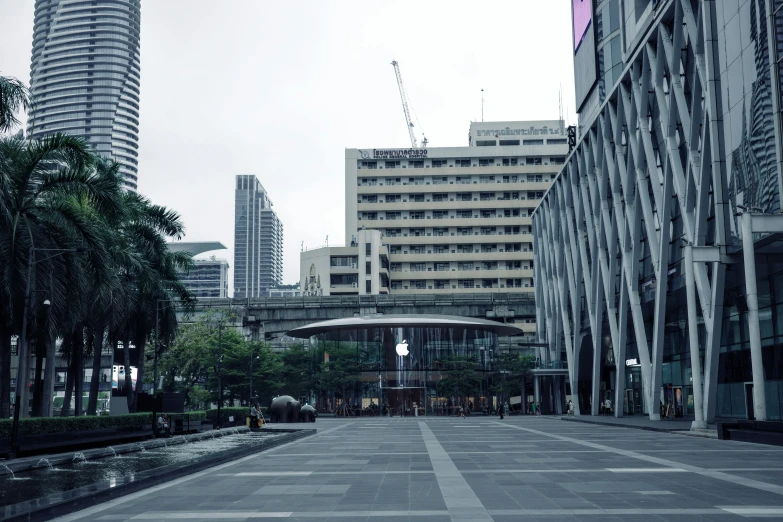 a long empty concrete street in a big city