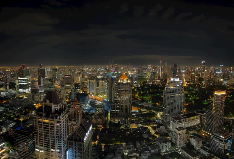 a big city at night with a lot of tall buildings