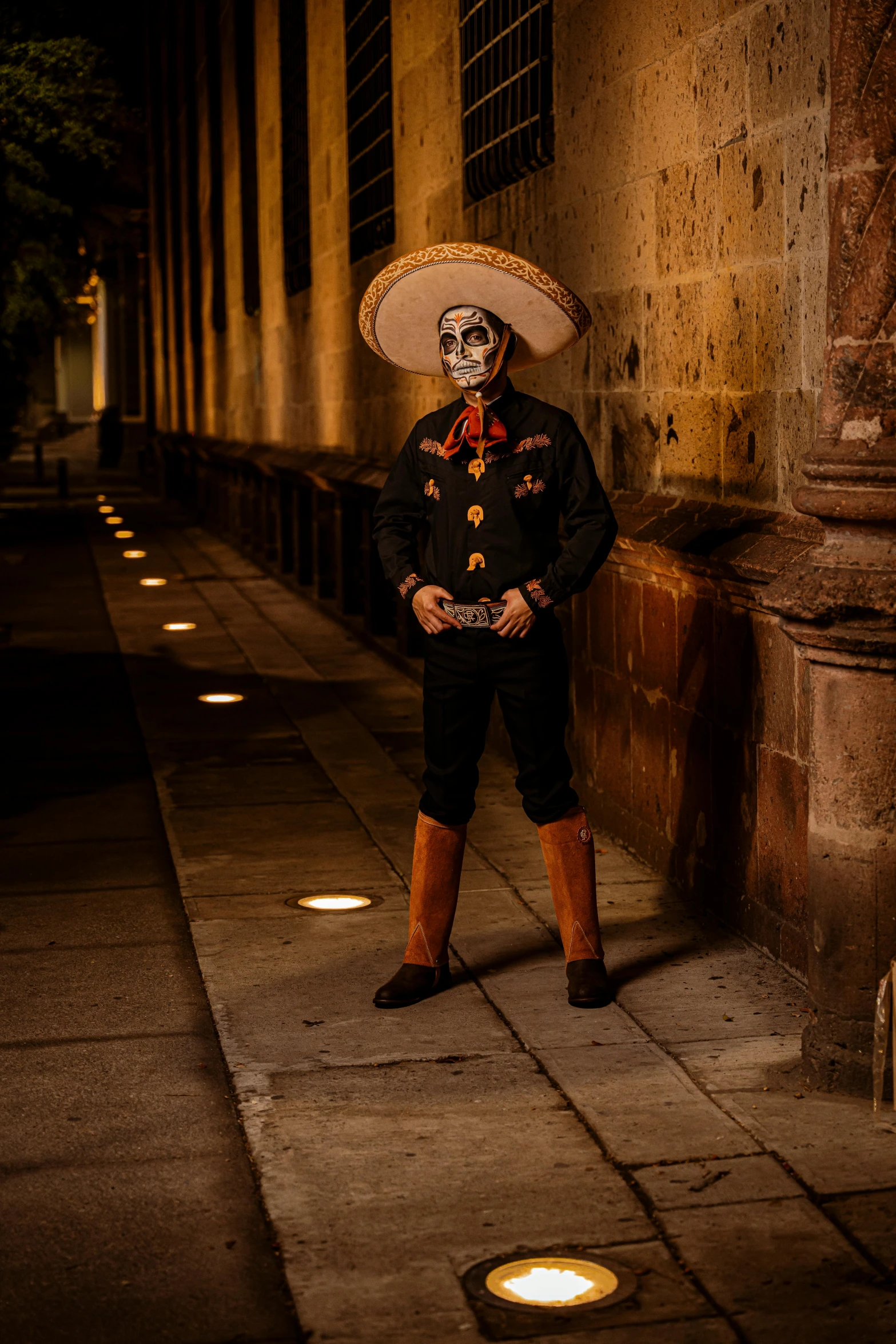 the costume worn by a man is wearing a sombrero