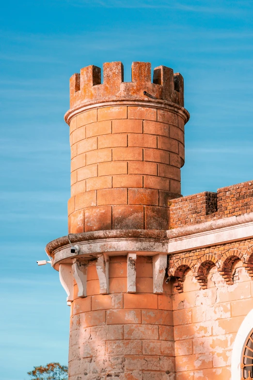 a large stone tower with several small towers on top of it