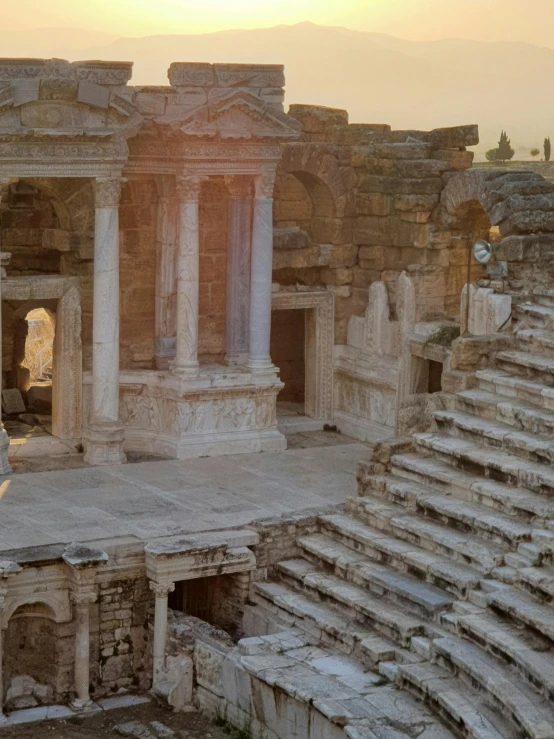 an empty amphit ruins in the middle of a desert